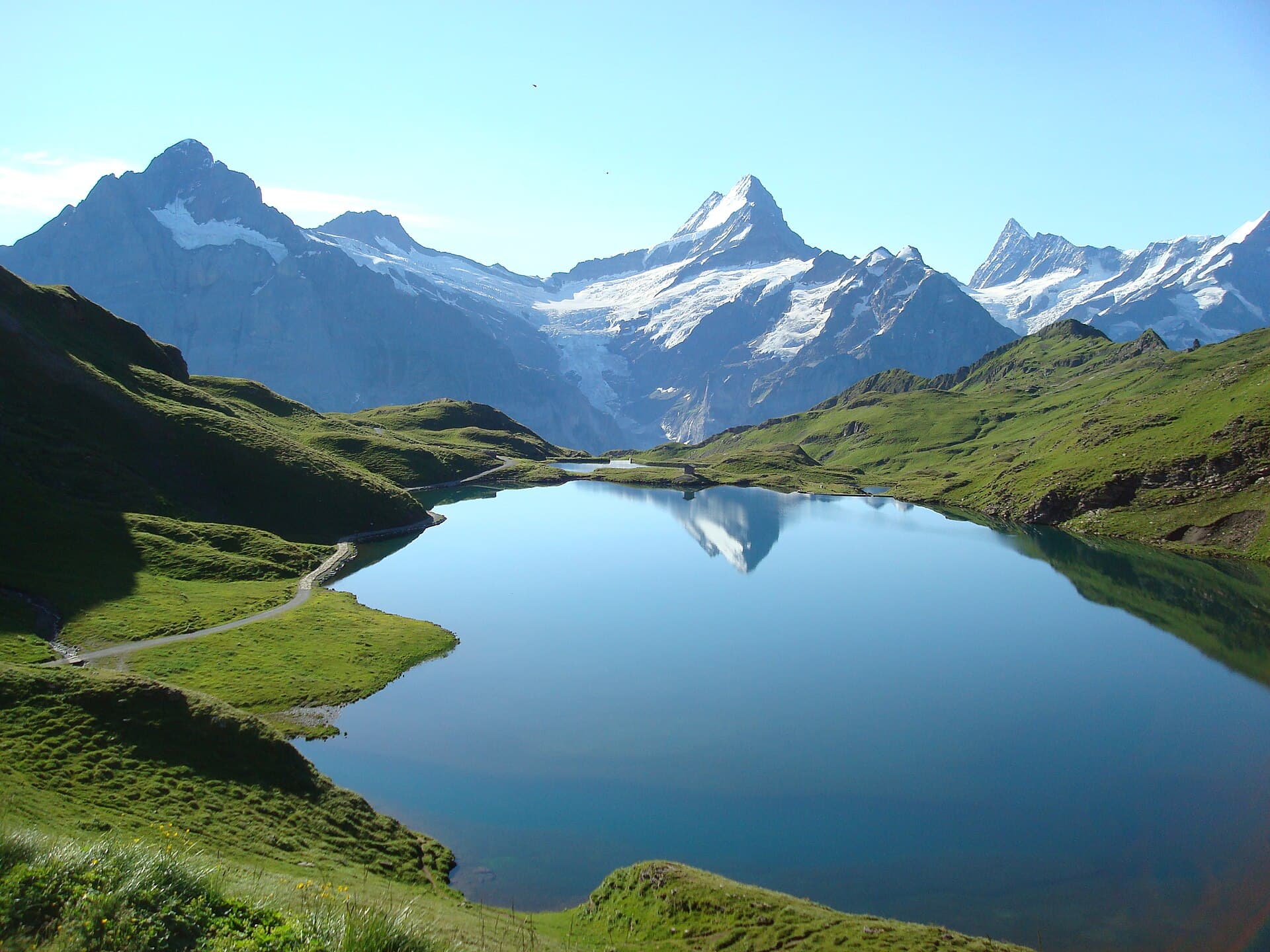 Bachalpsee mountain lake reflecting the Bernese Alps